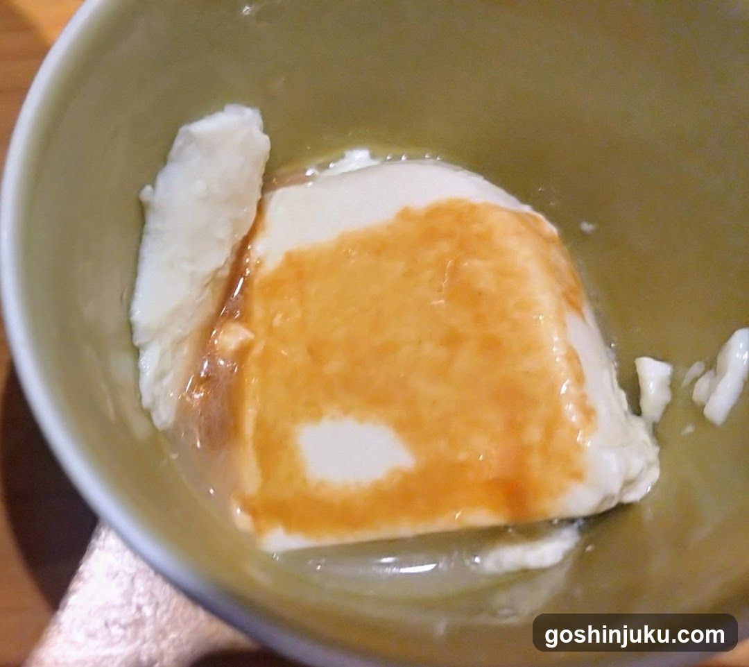 Bowl of Sweetened Tofu with Syrup