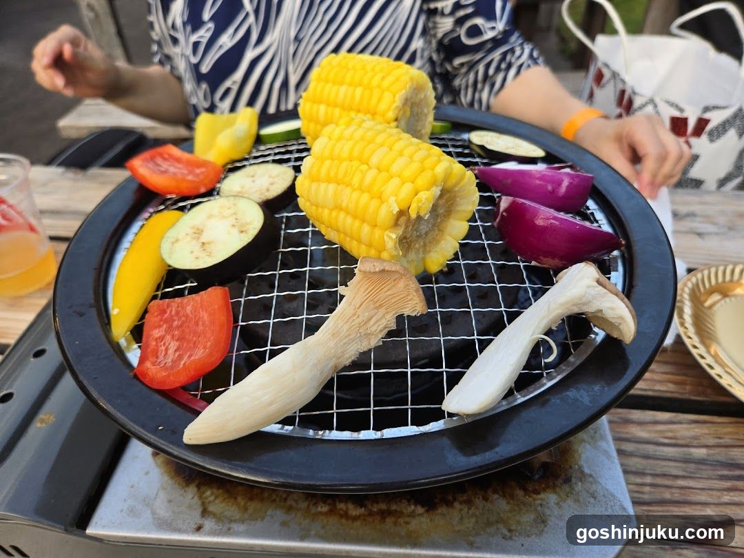 Outdoor BBQ Grill with Vegetables and Corn