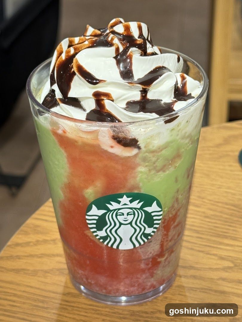 Starbucks Matcha Latte with Whipped Cream and Chocolate Drizzle