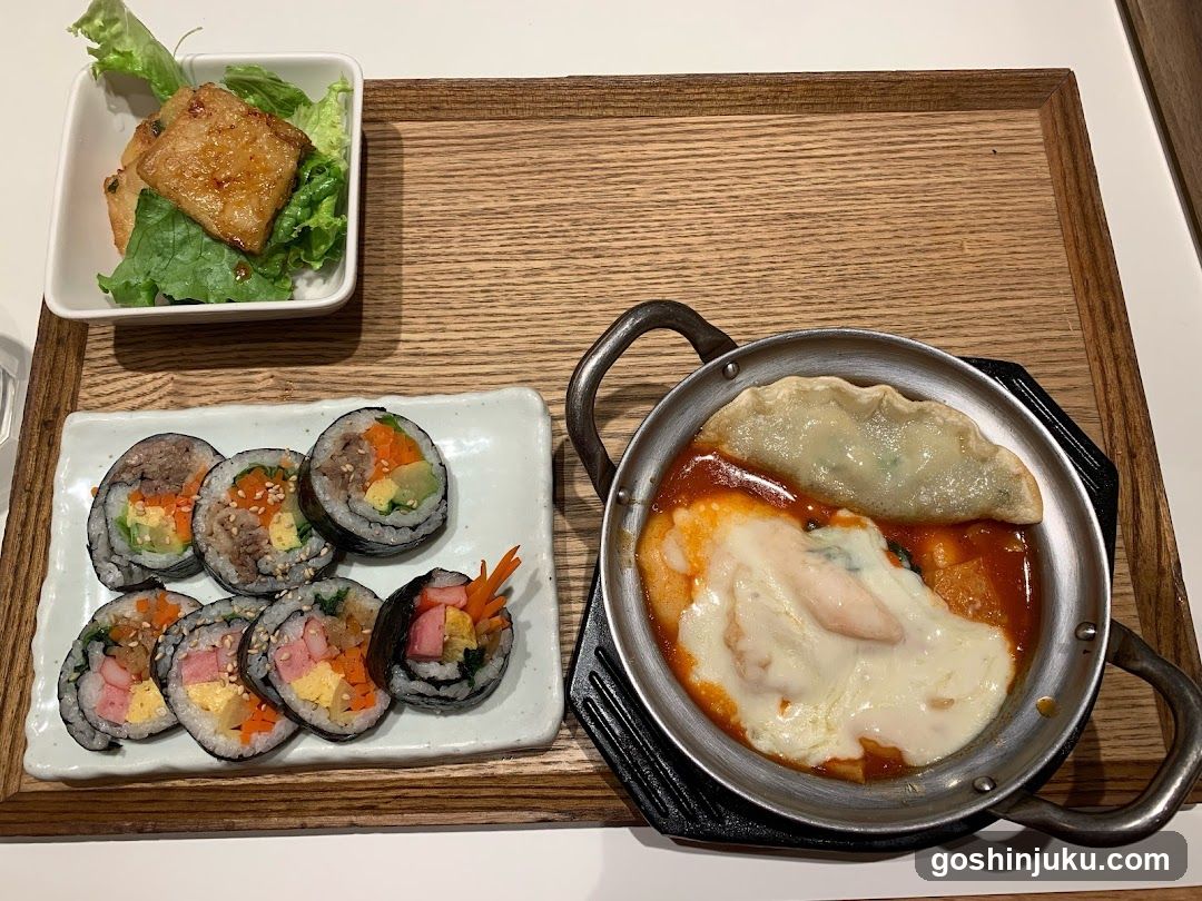 Korean-style meal with rice cakes and dumplings