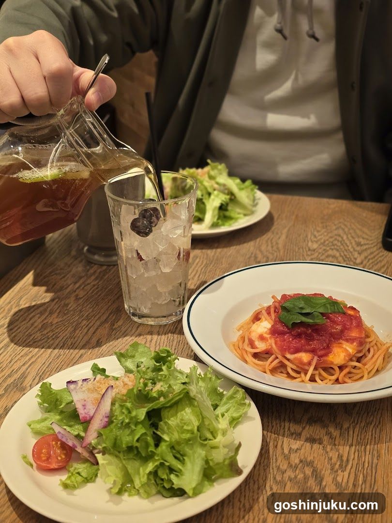 Dining Table with Pasta and Salad