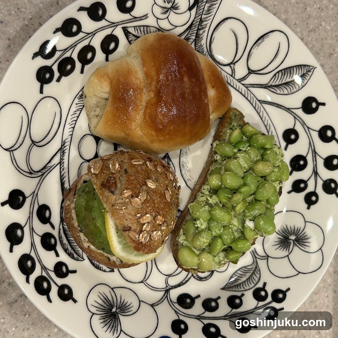 Breakfast Plate with Croissant, Edamame Toast, and Avocado Sandwich