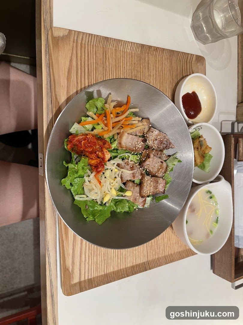 Korean-style meal with bibimbap and side dishes