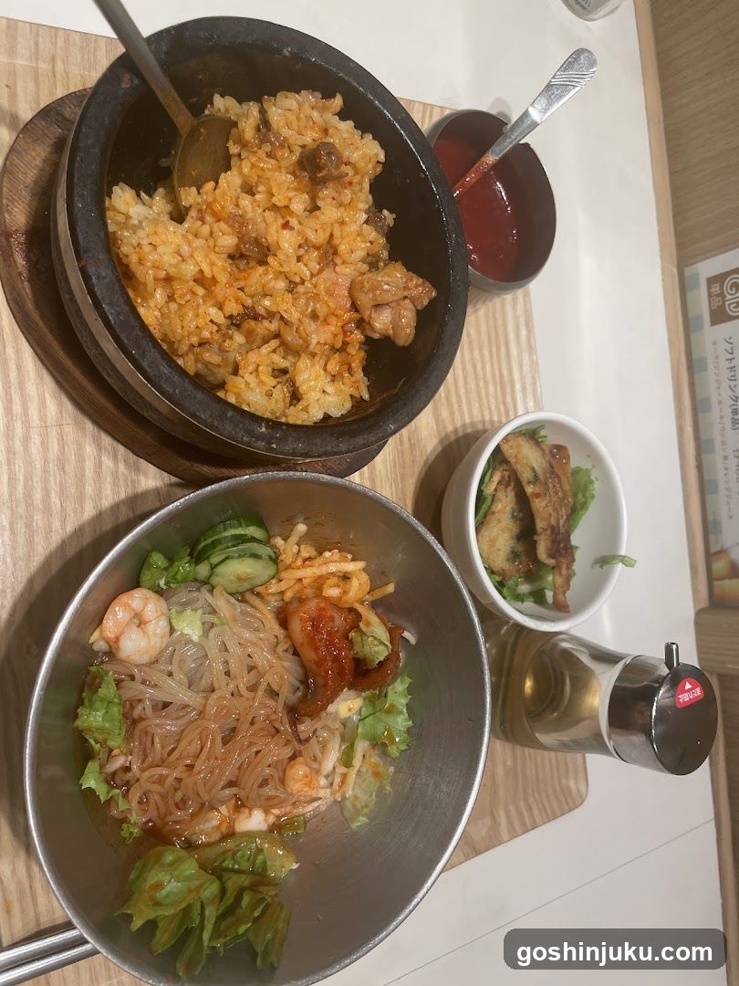 Korean-style meal with rice and cold noodles