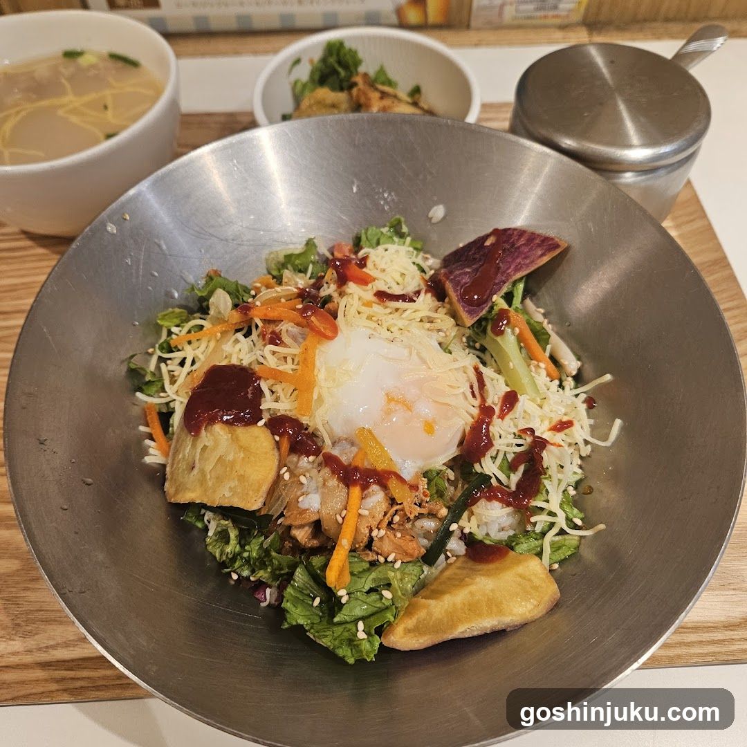 Bowl of Bibimbap with Fried Egg and Sesame Oil