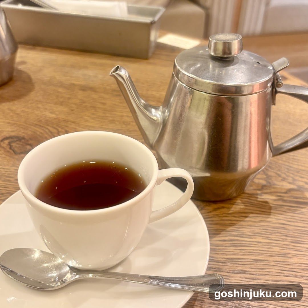 Tea and Teapot on Wooden Table
