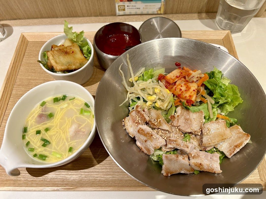 Korean-style meal with pork and soup