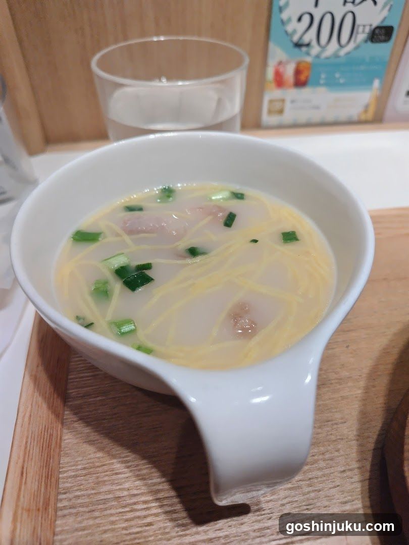 Bowl of Noodle Soup with Green Onions