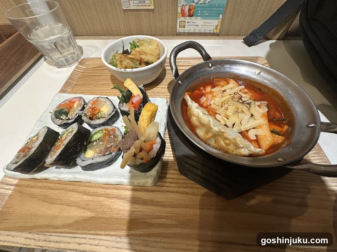 Korean-style meal with dumplings and rice cakes