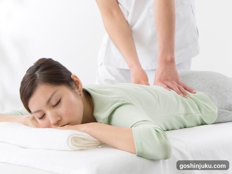 Woman Receiving a Back Massage