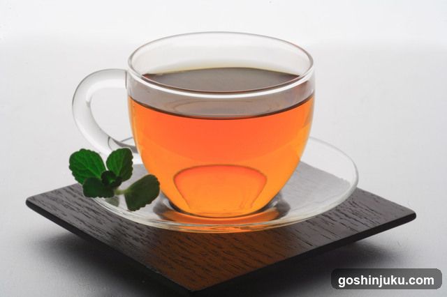 Tea Cup with Mint Leaves