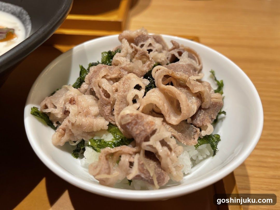 Bowl of Meat and Greens over Rice