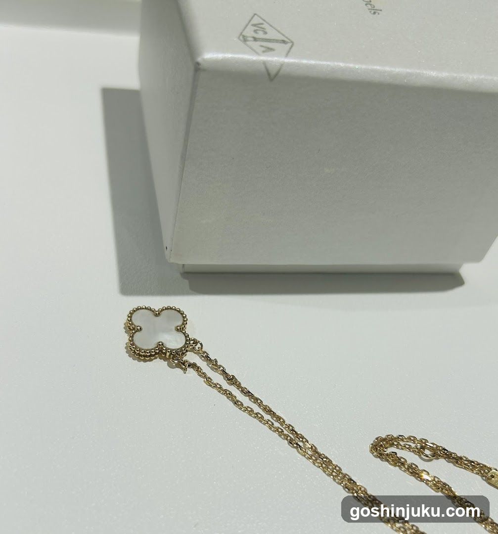 Gold Chain with White Flower Pendant