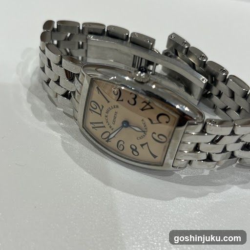 Cartier Watch on White Surface