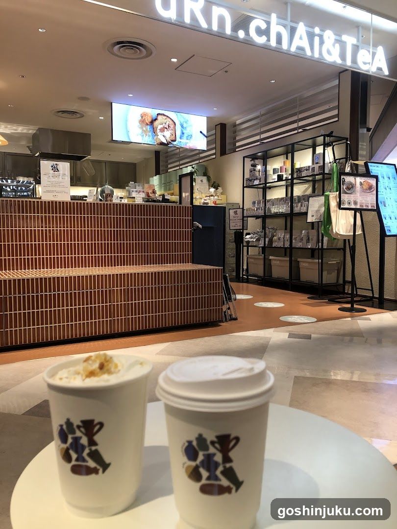 Coffee Shop Interior with Two Cups in Foreground