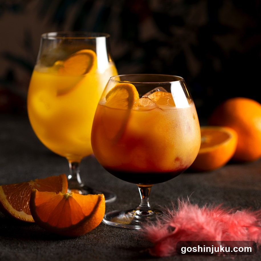 Orange Cocktails with Fresh Fruit Garnish