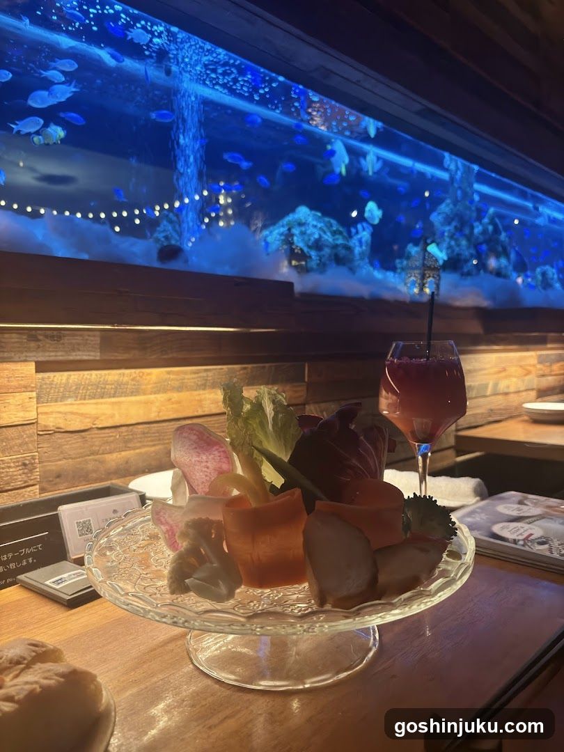 Sashimi and Drink with Aquarium Background