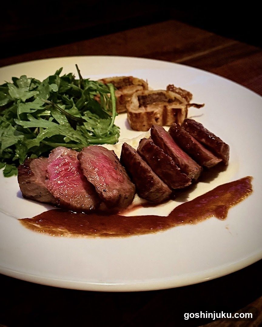 Sliced Steak with Arugula and Grilled Sausage