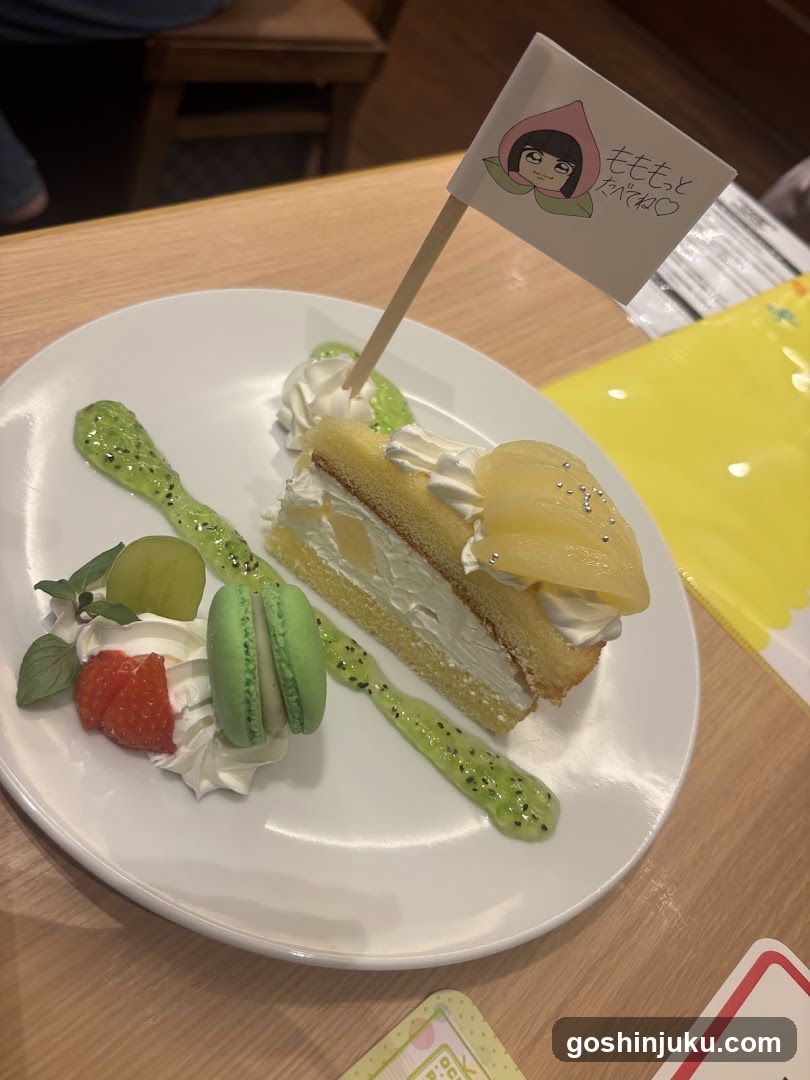Fruit Cake Slice with Macaron and Strawberries