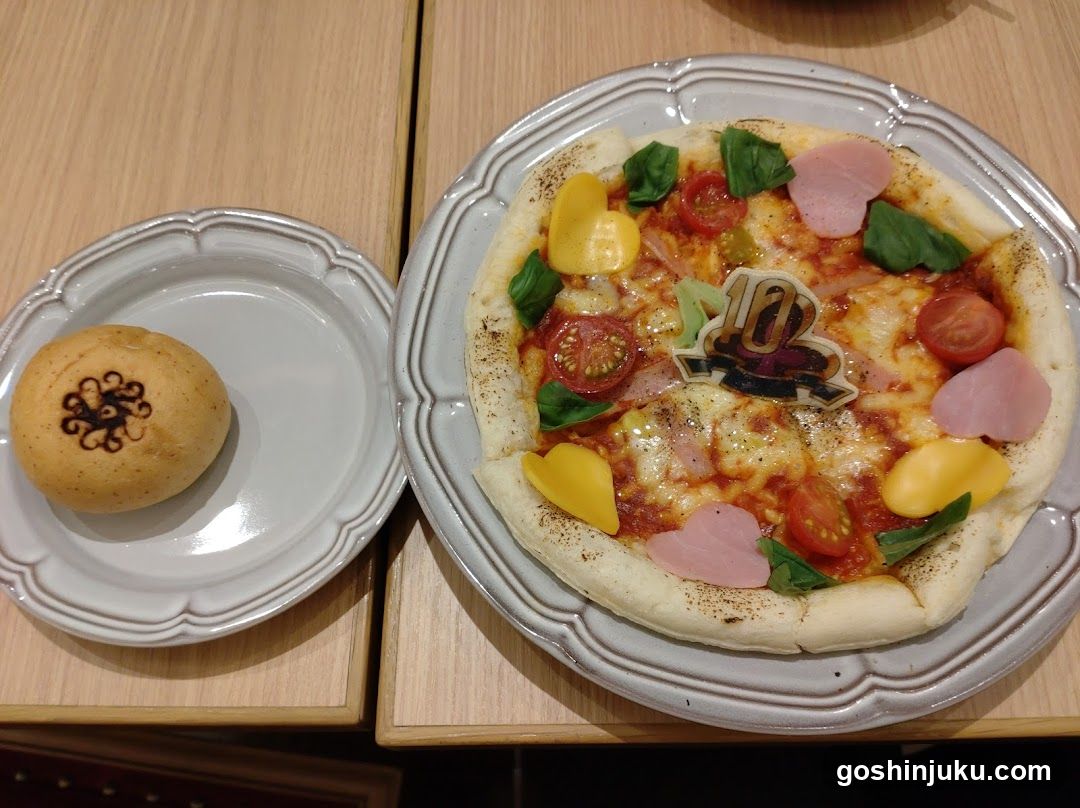 Pizza and Bun on Plates