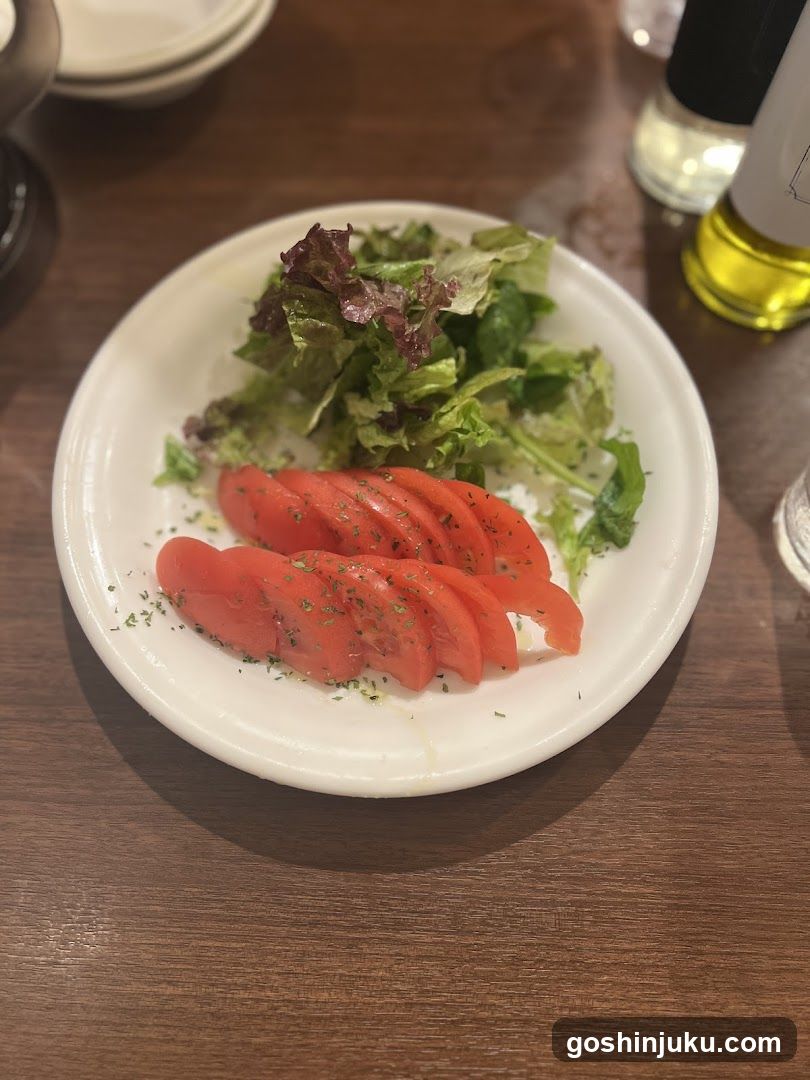 Sliced Tomatoes and Salad
