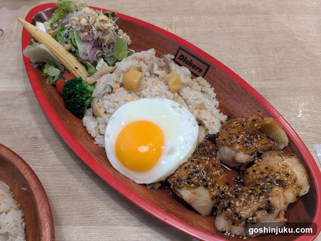 Bowl of Rice with Fried Egg and Chicken