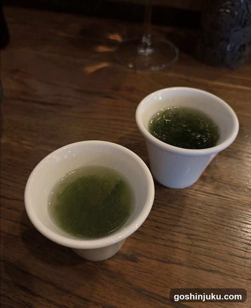 Green Tea Cups on Wooden Table