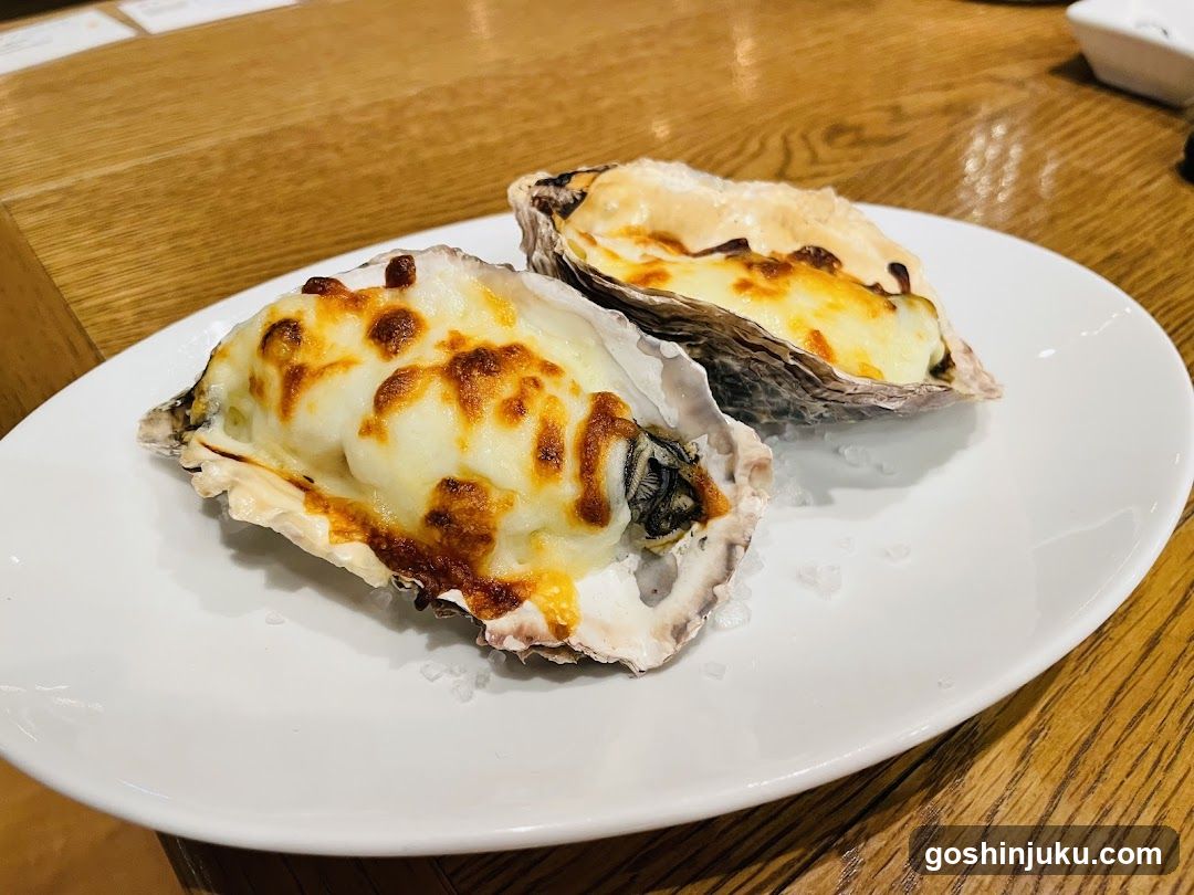 Baked Oysters on a White Plate
