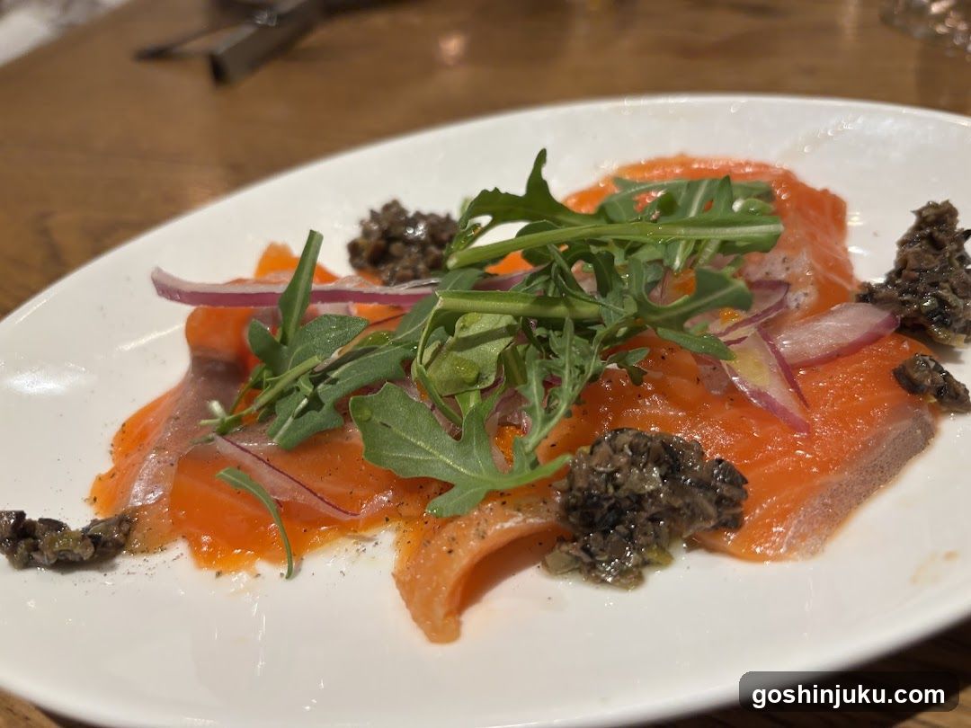 Salmon Carpaccio with Arugula and Caviar