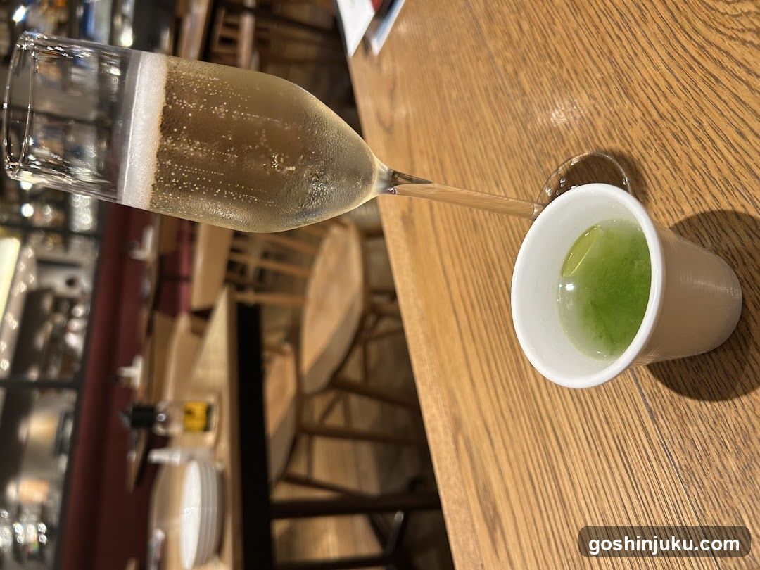 Matcha and Sparkling Drink at Bar Counter