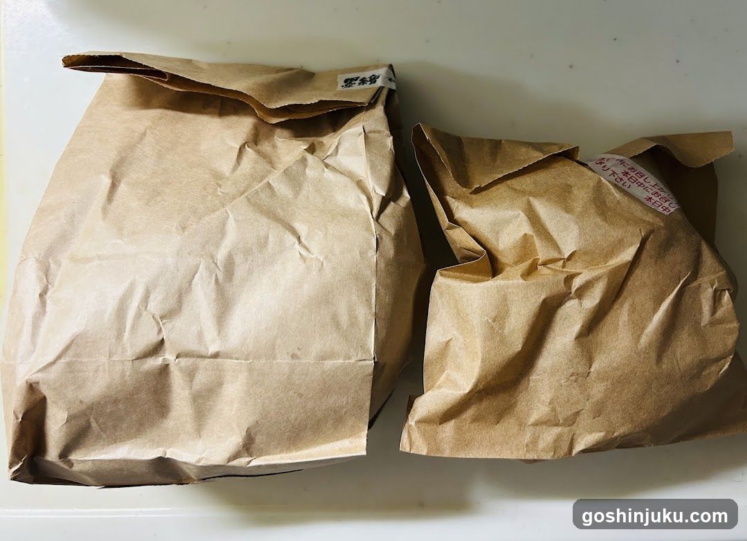 Brown paper packages on white surface
