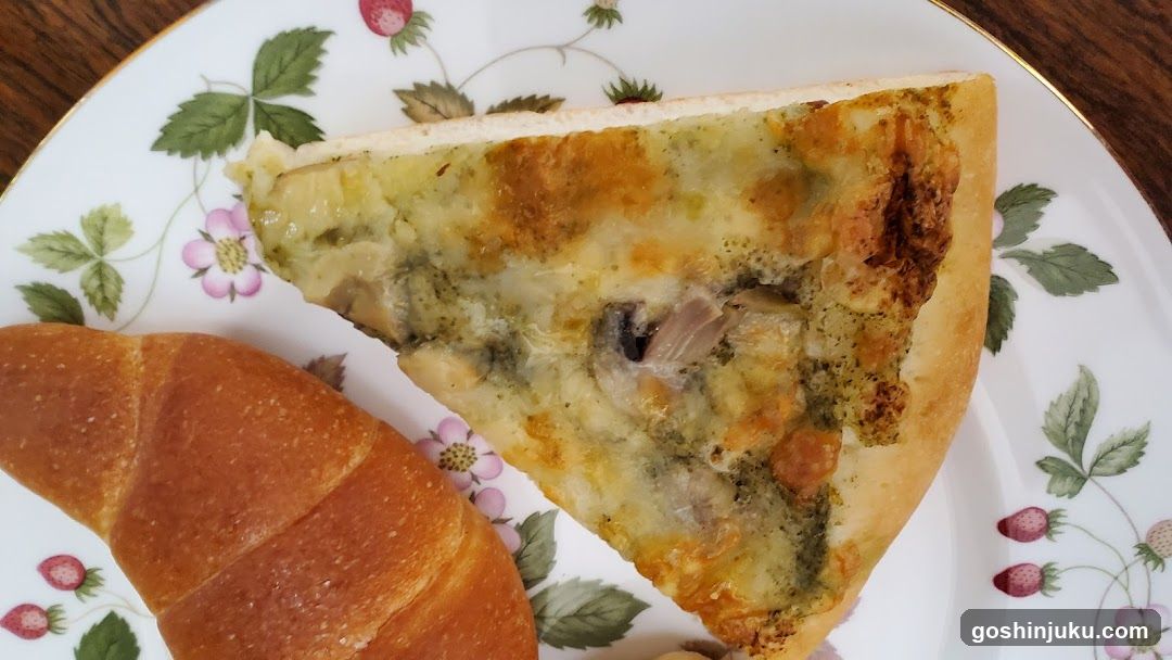 Pizza and Croissant on Floral Plate