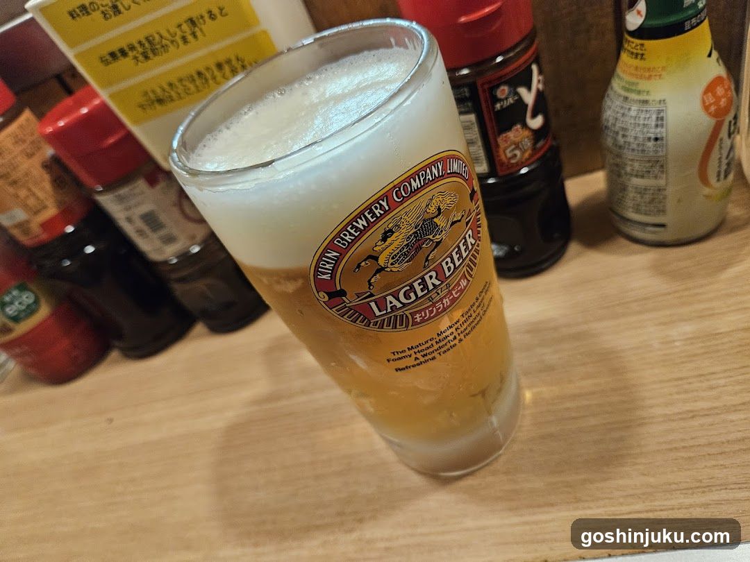 Beer Glass with Condiments in Background