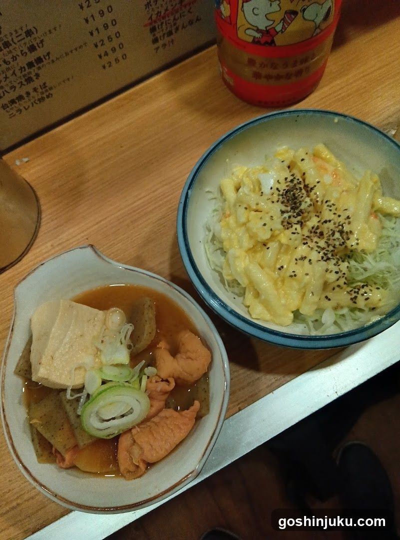 Food on table with menu board in background