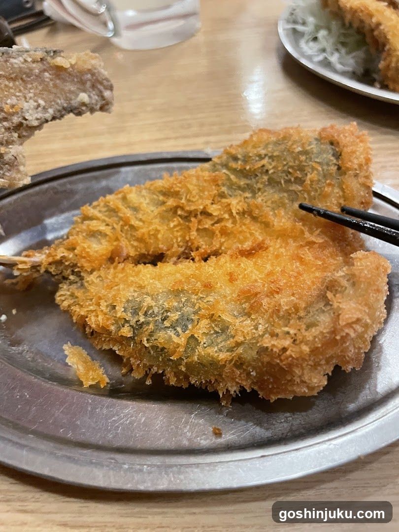 Fried Fish on Metal Plate