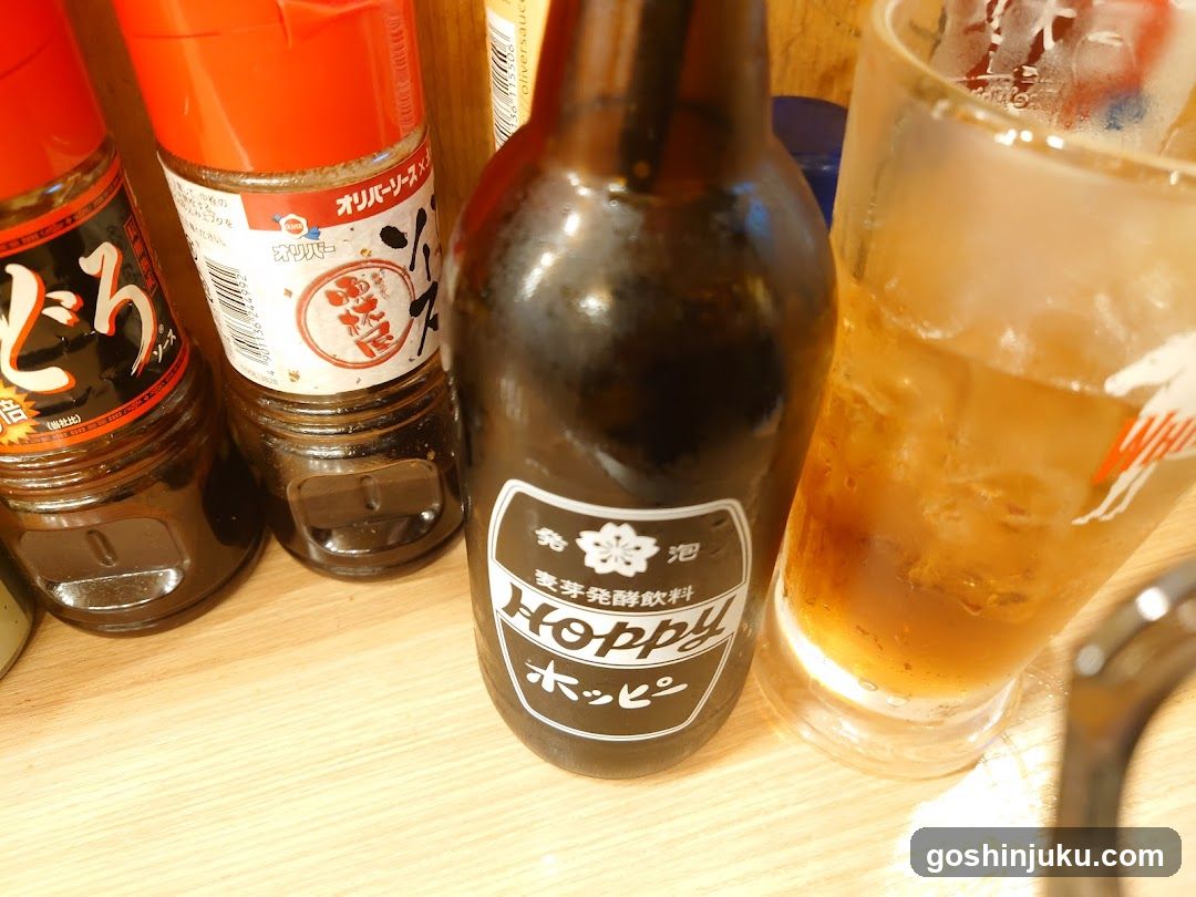 Bottles and Glass on Table