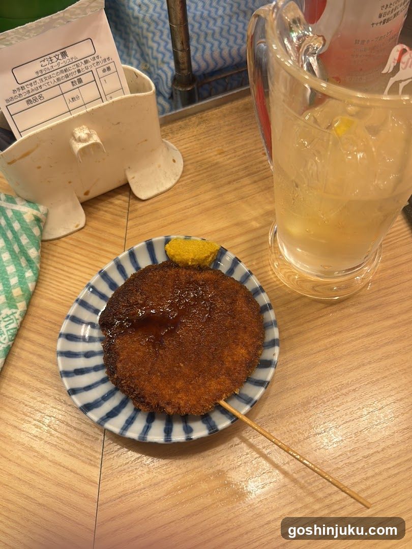 Karaage with lemon wedge and drink