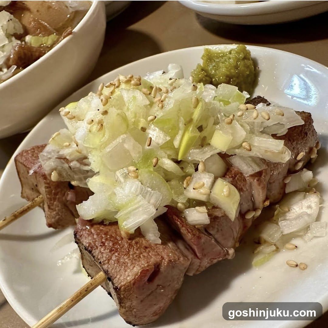 Grilled Meat Skewers with Onions and Sesame Seeds