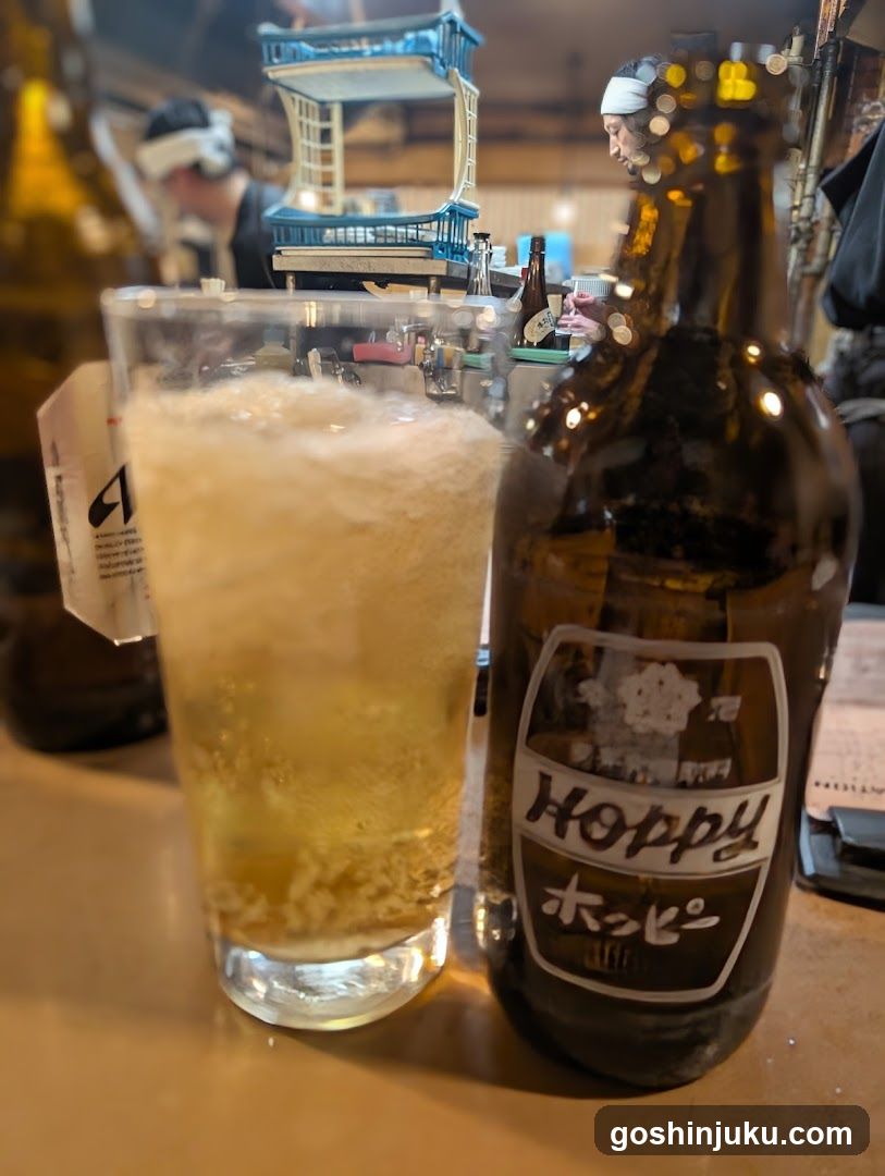 Beer bottle and glass in a bar setting