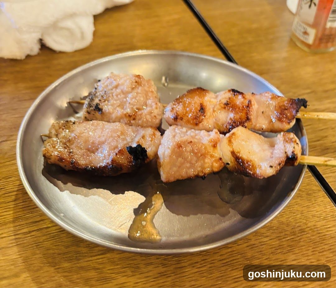 Grilled Meat Skewers on a Metal Plate