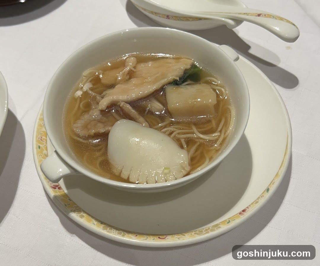 Bowl of Noodle Soup with Clam and Fish Ball