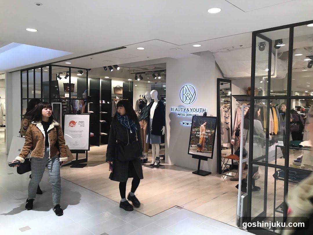 Fashion Store Interior with Mannequins and Shoppers