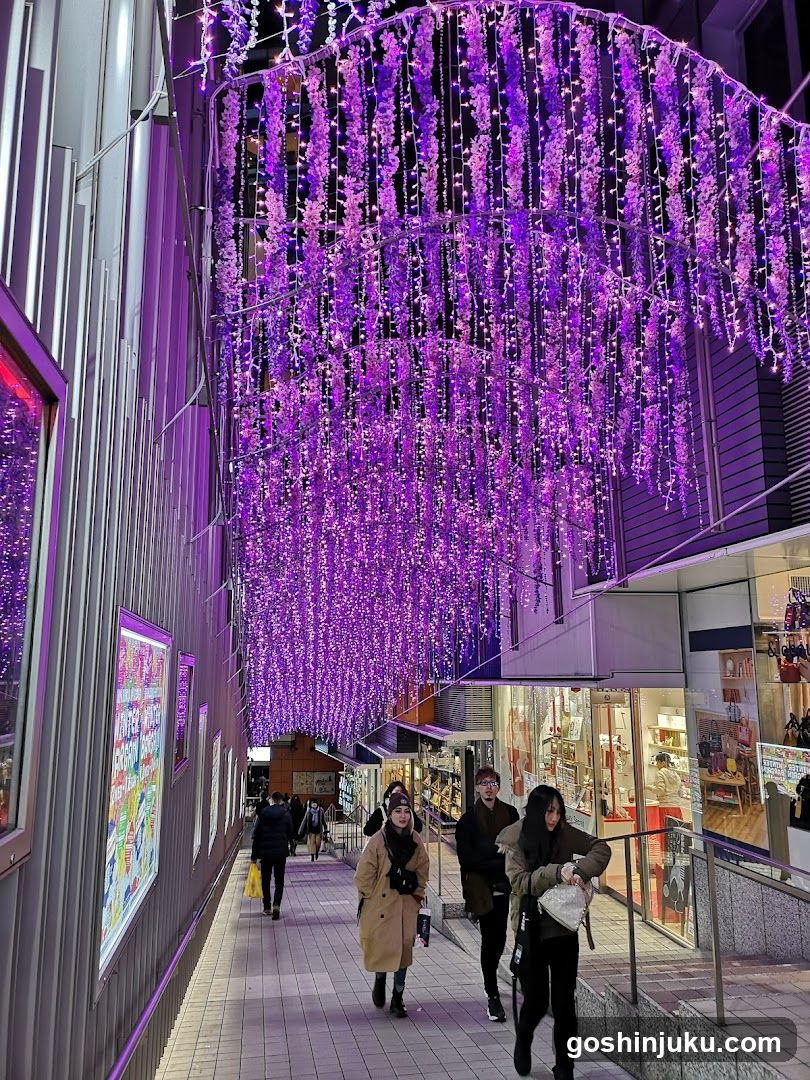 Purple illuminated street scene at night