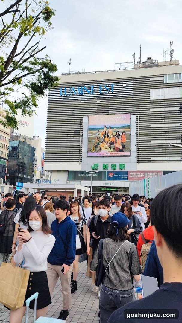 Crowded Street Scene with Lumine EST Building