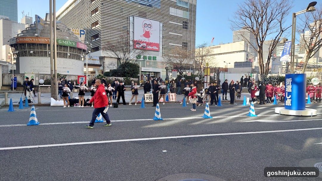 Street scene with performers and pedestrians