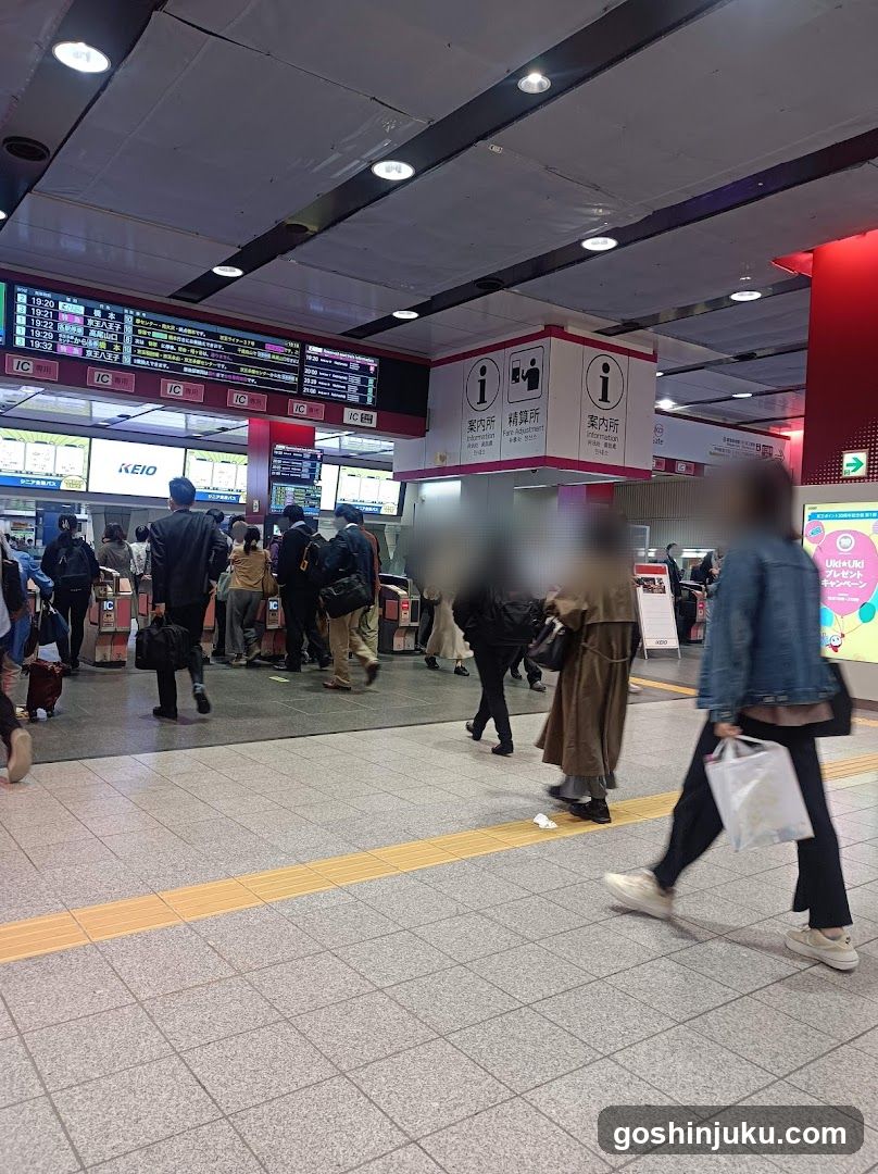 Station Interior with Passengers and Signage