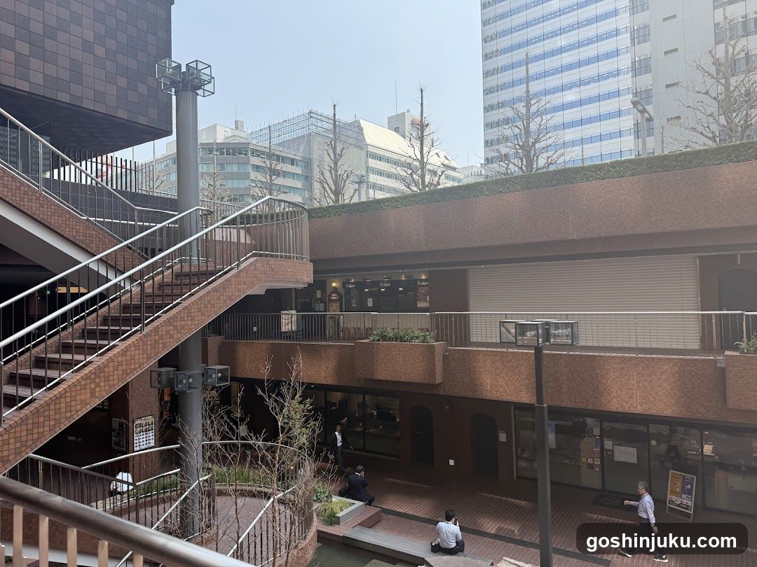 Urban Courtyard with Staircase and Shops