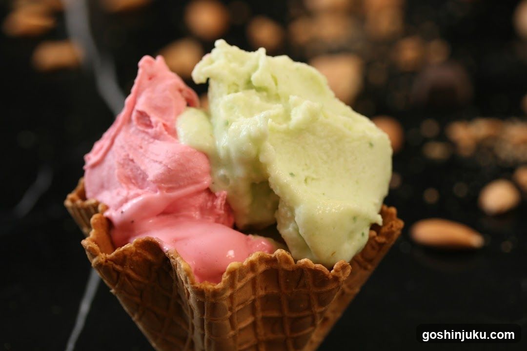Ice Cream Cone with Pink and Green Flavors