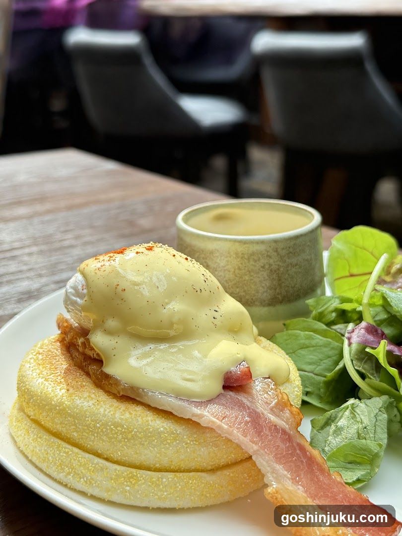 Eggs Benedict with Bacon and Salad