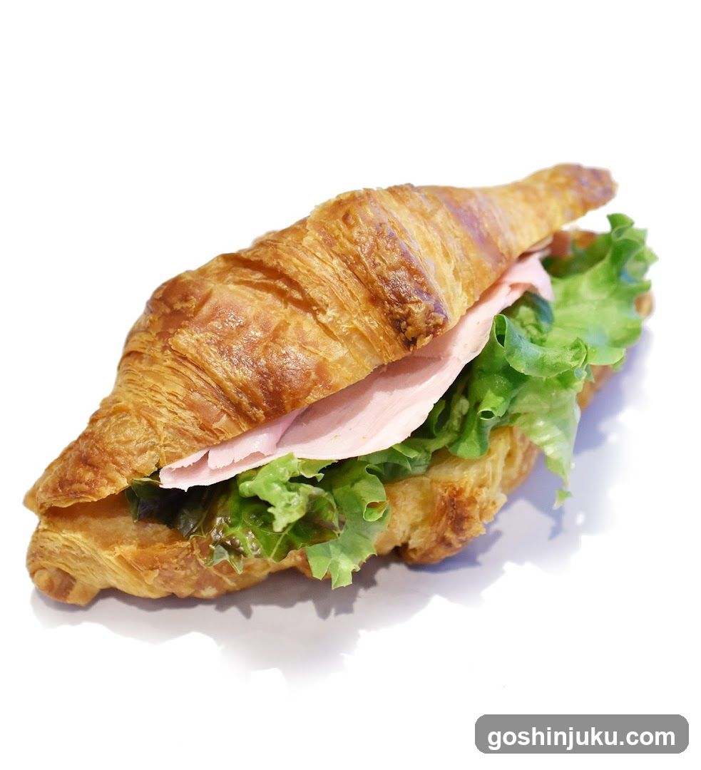 Croissant Sandwich with Ham and Lettuce